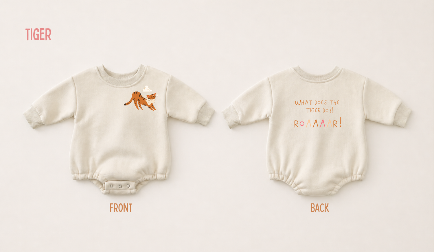 Front and back view of a cream fleece baby romper featuring a playful tiger illustration and “Roaaar!” text on a soft neutral background.